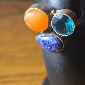Beautiful Sterling Silver Multi-Stone Ring with Orange, Blue, and Purple Gems